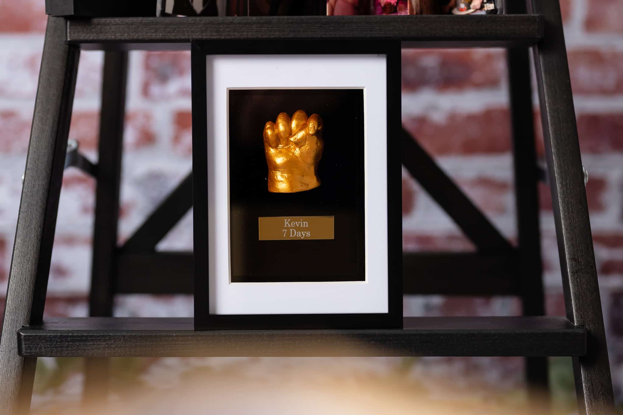 Baby hand casting in frame