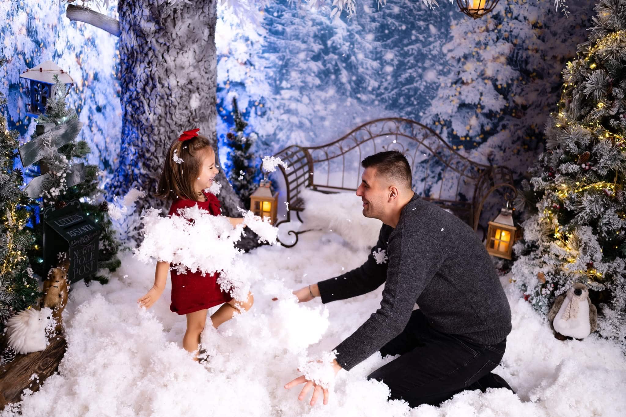 Mihai Gonguta photographer Milton Keynes playing with child during Christmas studio session