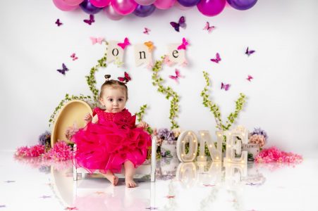 Baby girl enjoying the cake session