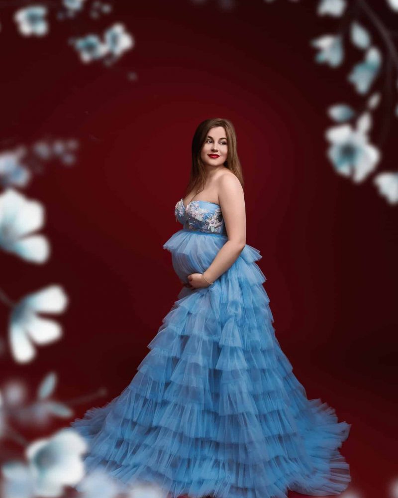 Timeless maternity gown for indoor studio photoshoots