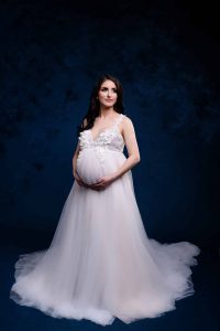 Pregnancy photoshoot celebrating femininity and strength
