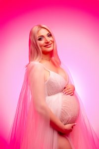 Professional maternity photography with a minimalist background