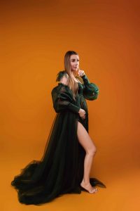 Pregnancy portrait highlighting maternal connection and love