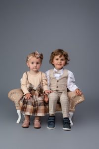 Happy children laughing together photoshoot