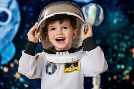 Happy child laughing during photoshoot session