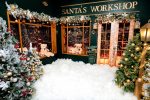 Santa's Workshop shopfront with snow and decorated trees, Christmas studio set
