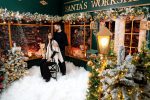 Santa's Workshop set with snow, lanterns and decorated trees, Northampton studio