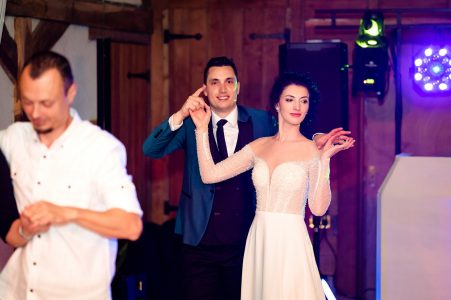 Priest blessing couple during wedding ceremony Milton Keynes